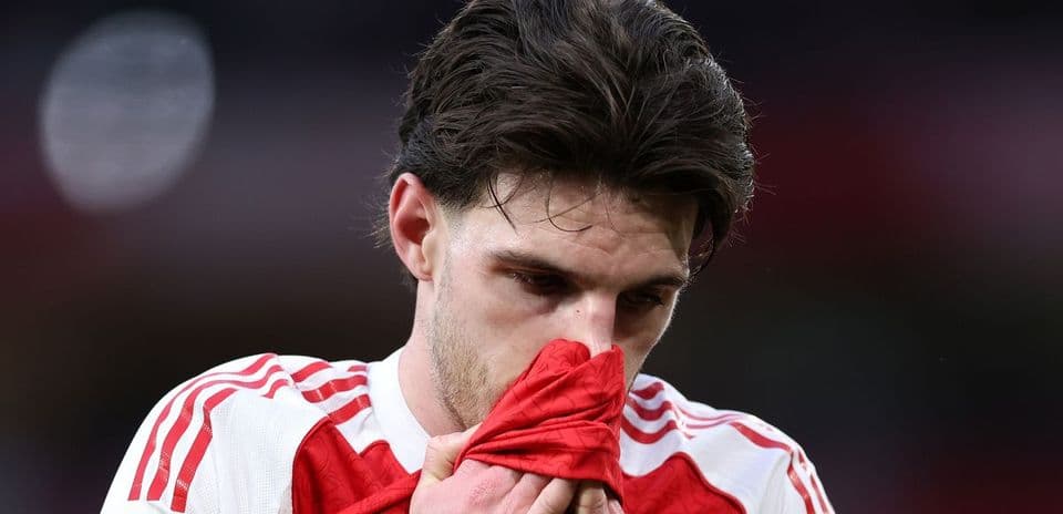 Player holding shirt to face during match Player holding shirt to face during match