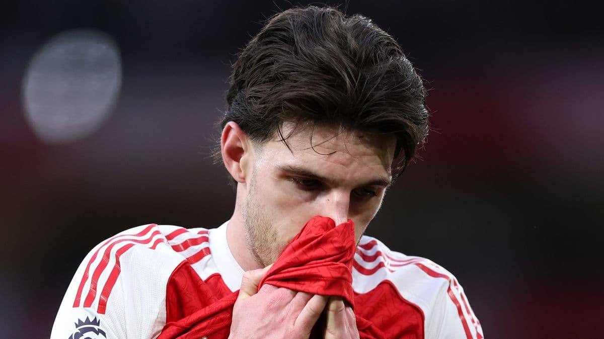Player holding shirt to face during match Player holding shirt to face during match