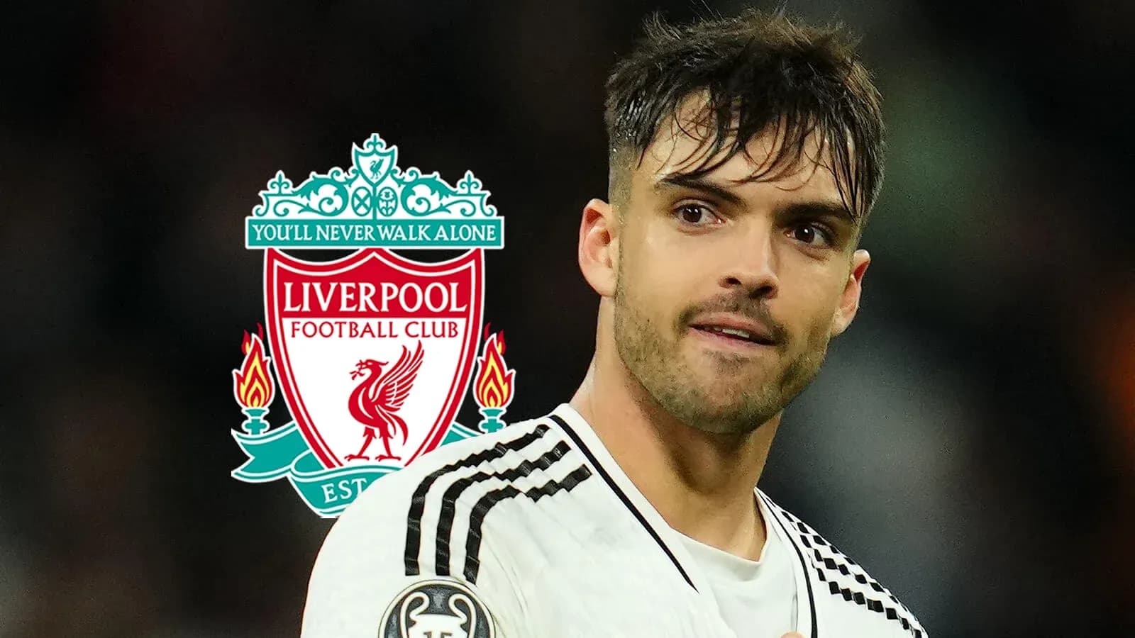 Player in foreground with Liverpool FC logo behind Player in foreground with Liverpool FC logo behind