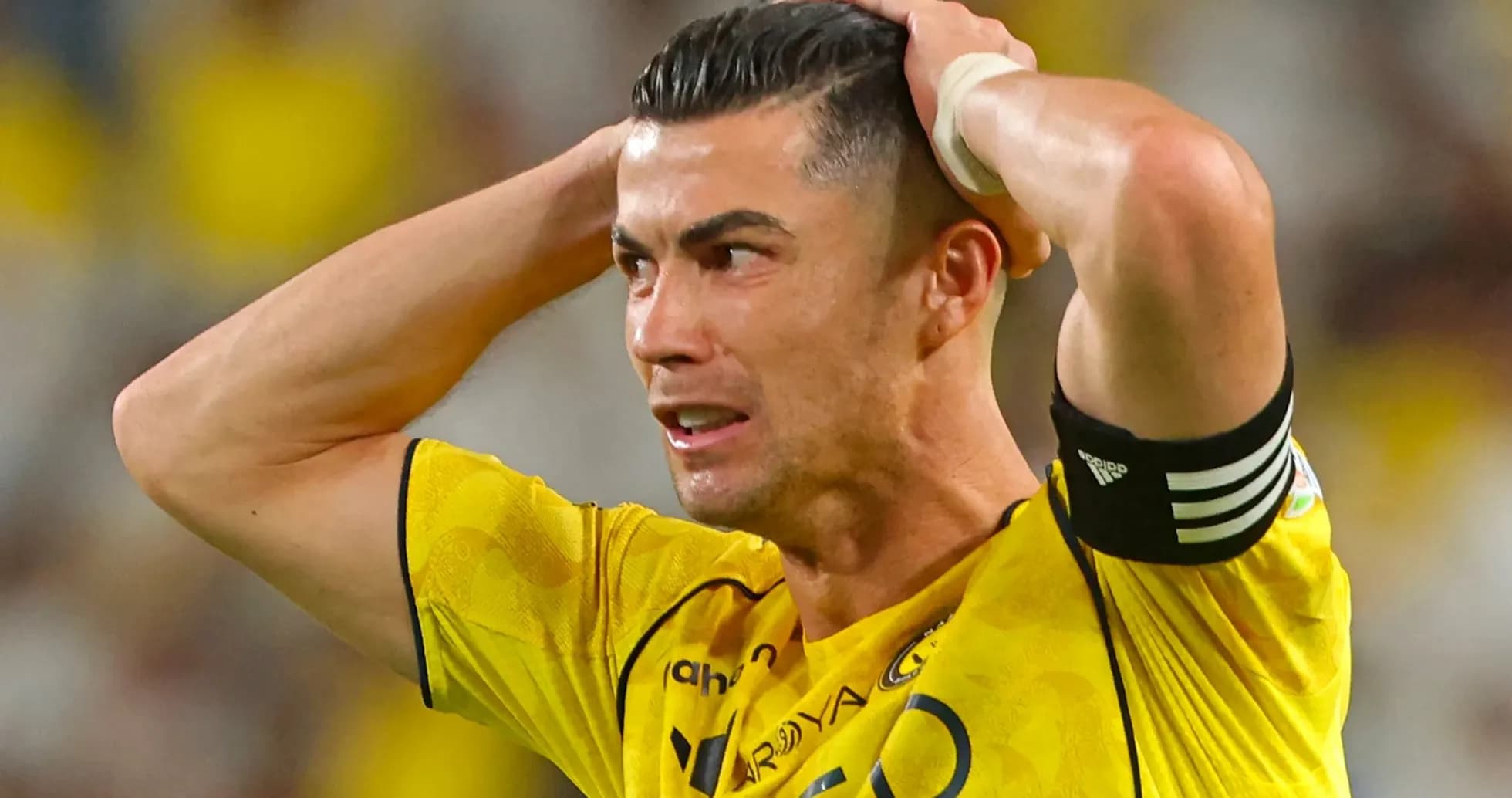 Player in yellow jersey showing frustration during match Player in yellow jersey showing frustration during match