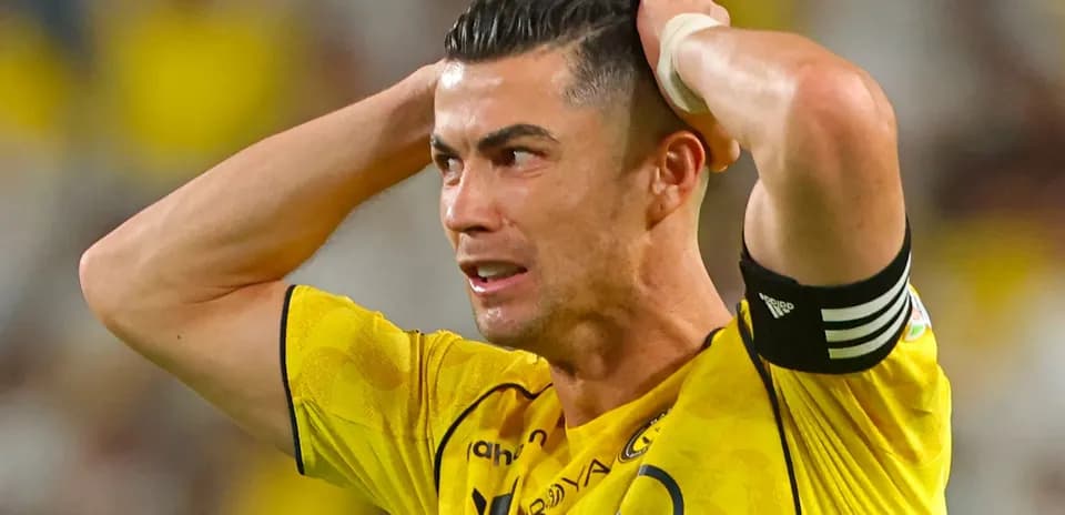 Player in yellow jersey showing frustration during match Player in yellow jersey showing frustration during match