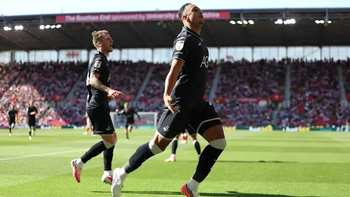 Swansea City player celebrating a goal during match Swansea City player celebrating a goal during match