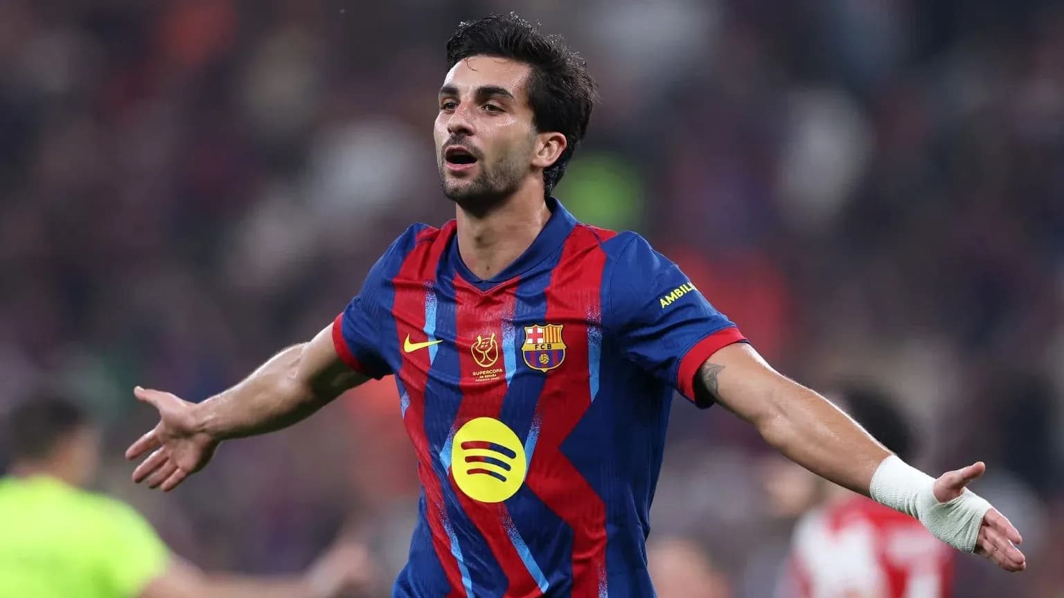 Player celebrating after scoring a goal for Barcelona Player celebrating after scoring a goal for Barcelona