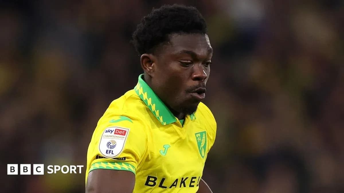 Player in yellow jersey running during match Player in yellow jersey running during match