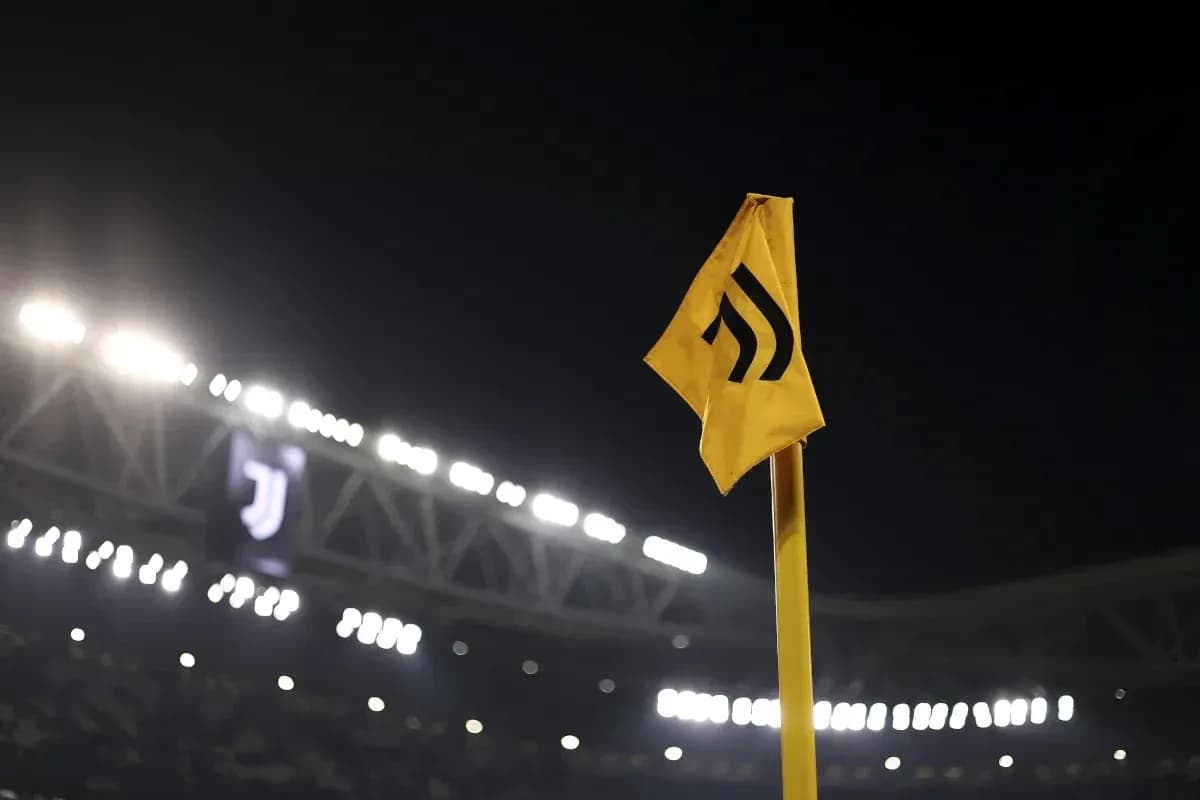 Corner flag with Juventus logo at night stadium Corner flag with Juventus logo at night stadium