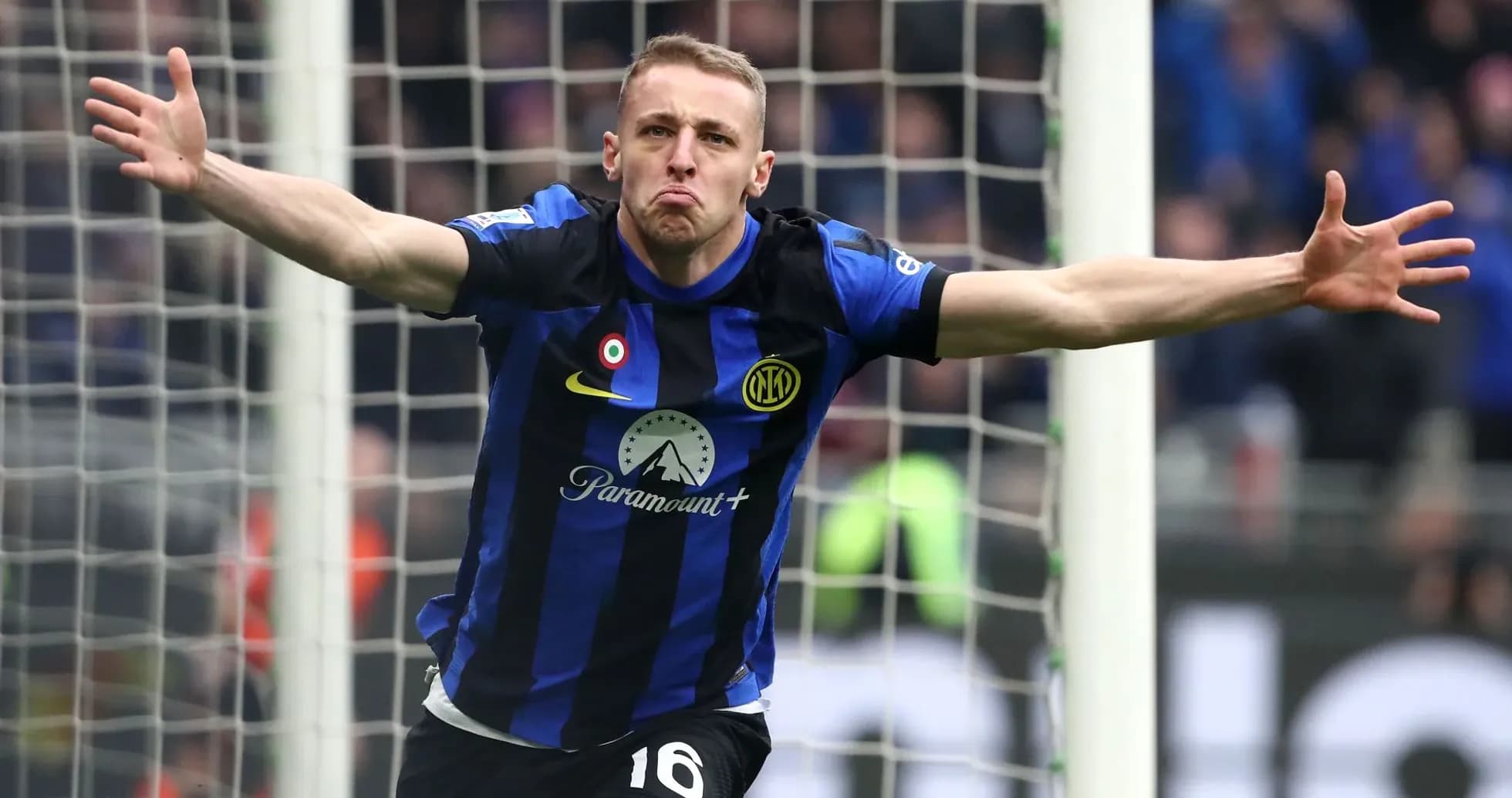 Player celebrating a goal in front of the net Player celebrating a goal in front of the net