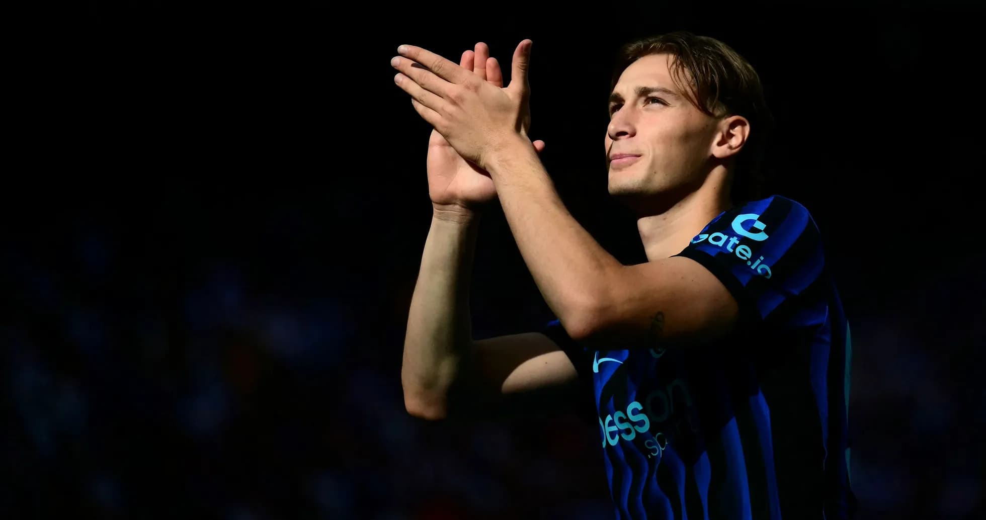 Player applauding fans during a match Player applauding fans during a match