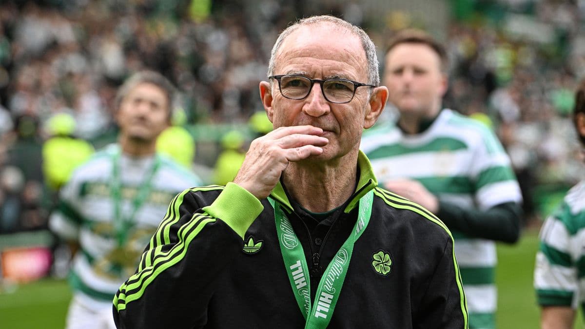 Manager with glasses observing crowd at stadium Manager with glasses observing crowd at stadium