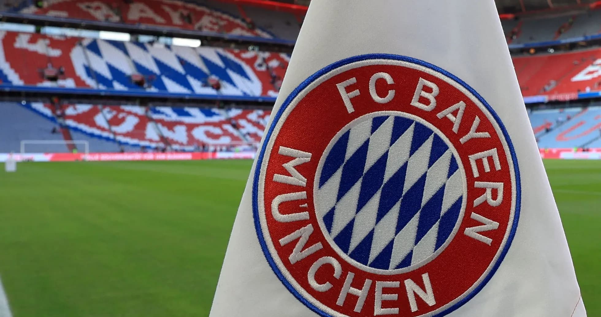FC Bayern Munich flag in stadium with fan display FC Bayern Munich flag in stadium with fan display