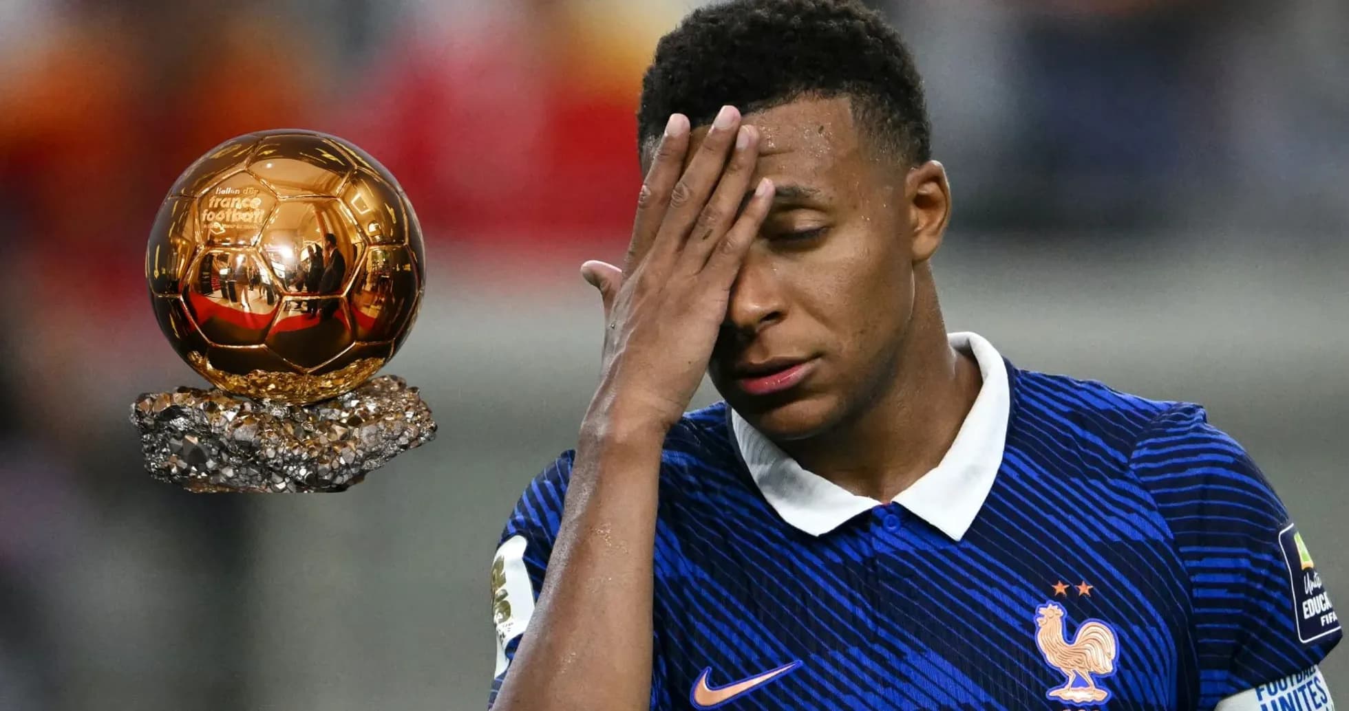 Player holding head with Ballon d'Or nearby Player holding head with Ballon d'Or nearby