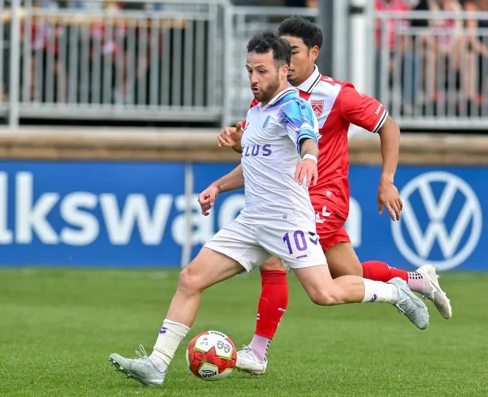 Player dribbling the ball during match Player dribbling the ball during match