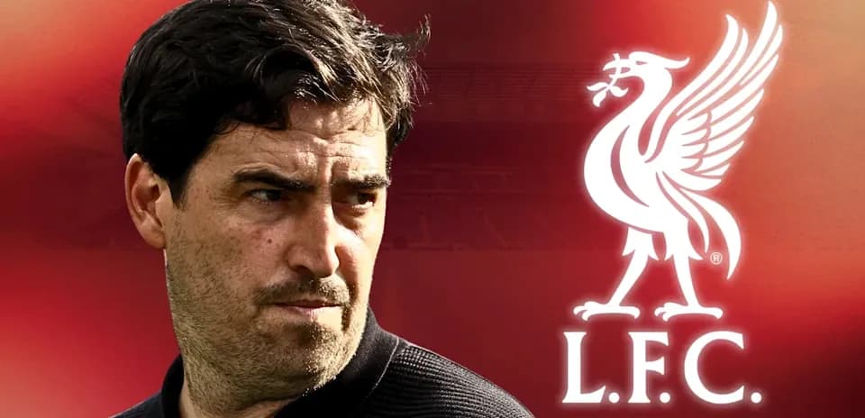 Coach with Liverpool FC logo in background Coach with Liverpool FC logo in background