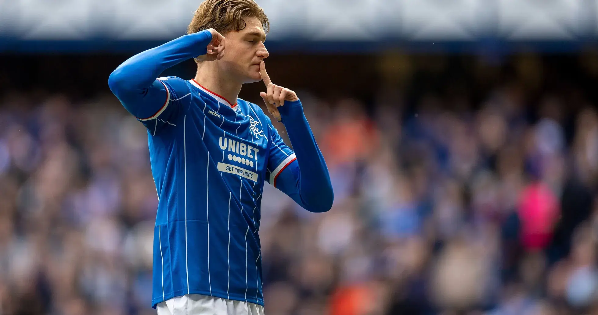 Player gesturing for silence during match celebration Player gesturing for silence during match celebration