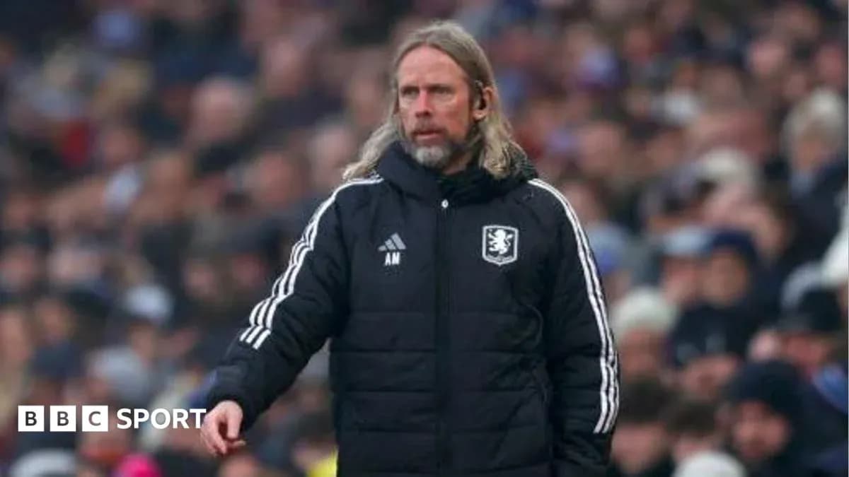 Coach on the sideline during a football match Coach on the sideline during a football match