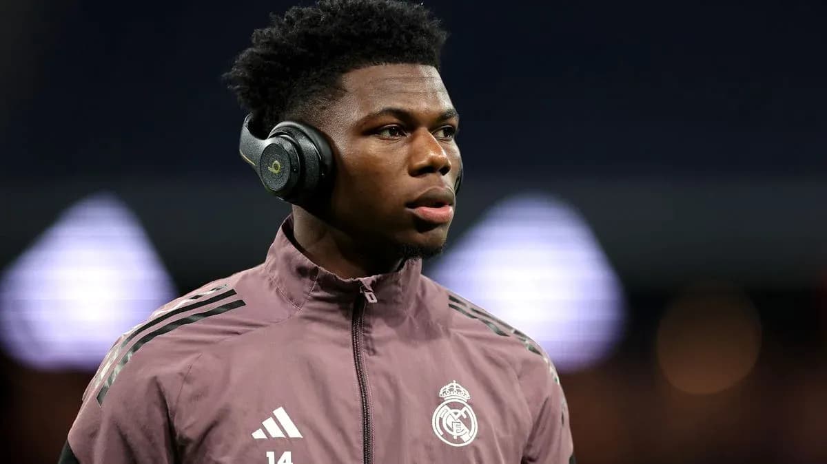 Player wearing headphones during warm-up at stadium Player wearing headphones during warm-up at stadium