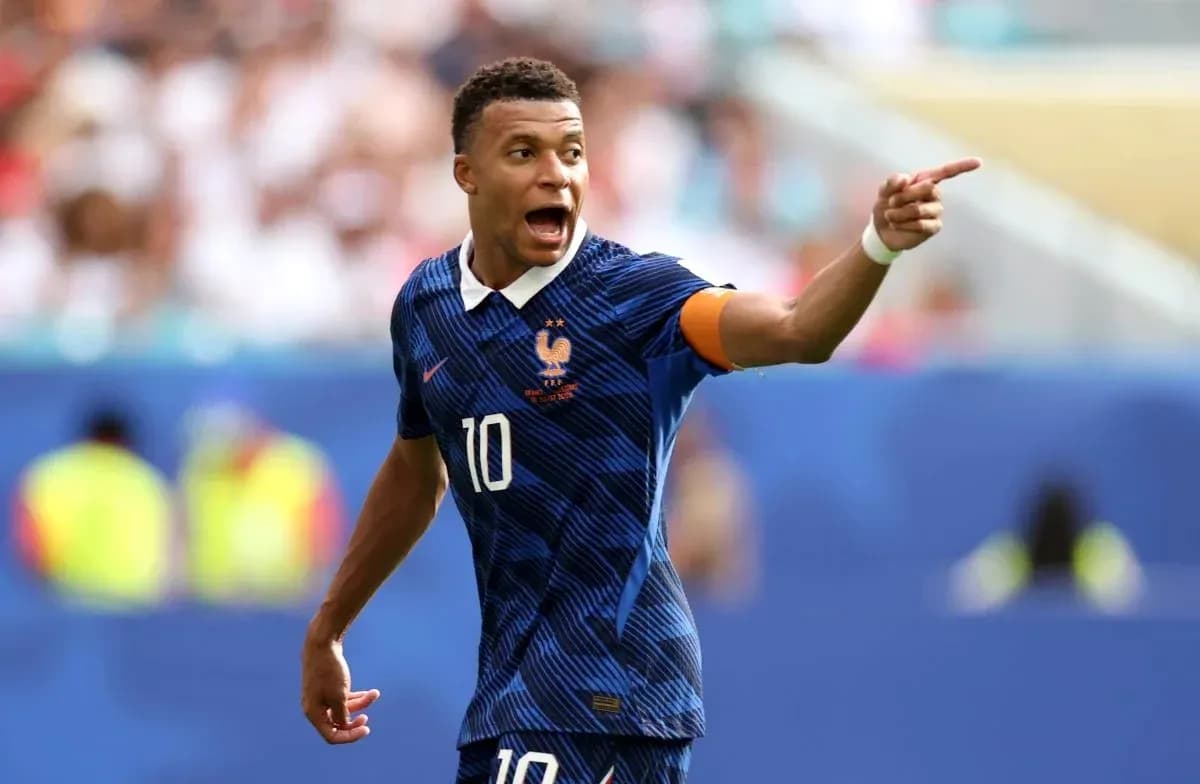 Kylian Mbappé directing teammates during a match Kylian Mbappé directing teammates during a match