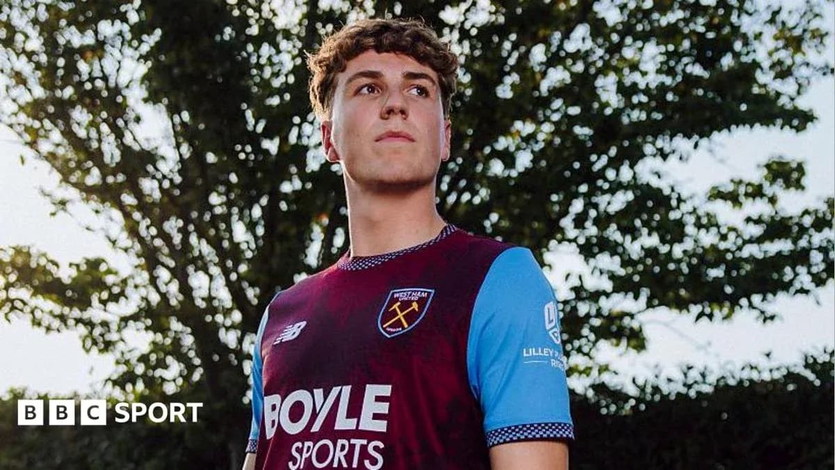 Player posing in West Ham United jersey outdoors Player posing in West Ham United jersey outdoors