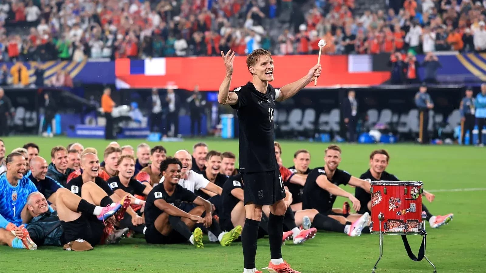 Player celebrating with teammates after a victory Player celebrating with teammates after a victory
