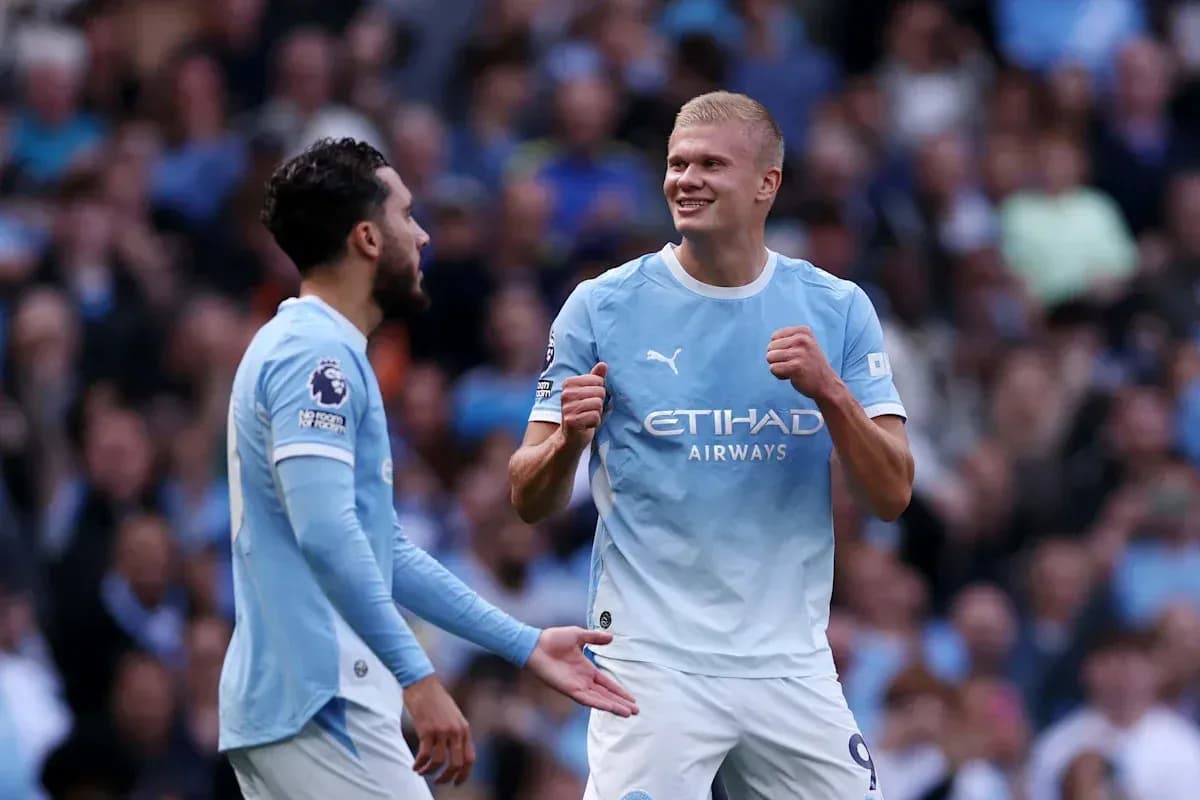 Manchester City players celebrating during match Manchester City players celebrating during match