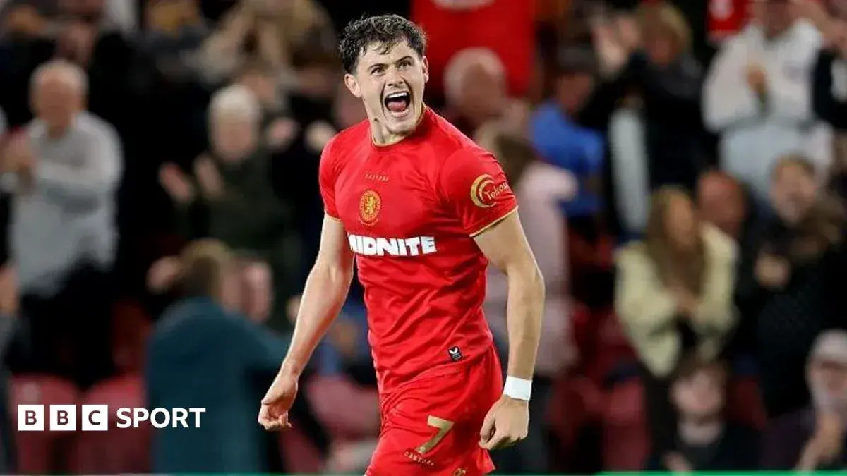 Player celebrating after scoring a goal in match Player celebrating after scoring a goal in match