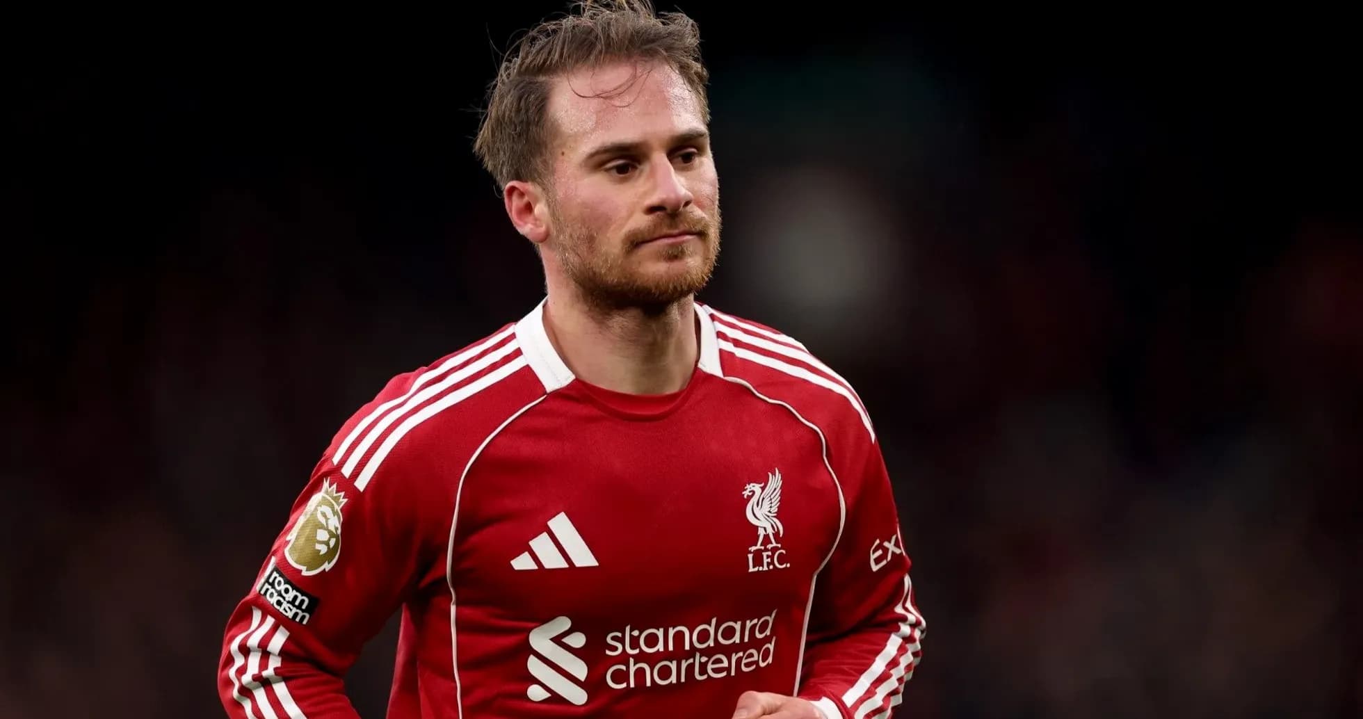 Player in Liverpool FC kit during a match Player in Liverpool FC kit during a match