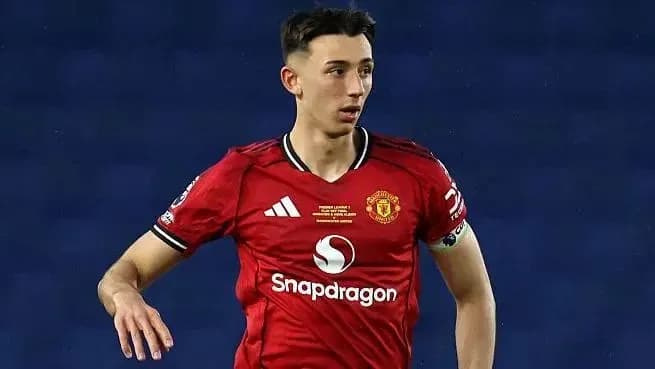 Player in Manchester United kit during match Player in Manchester United kit during match