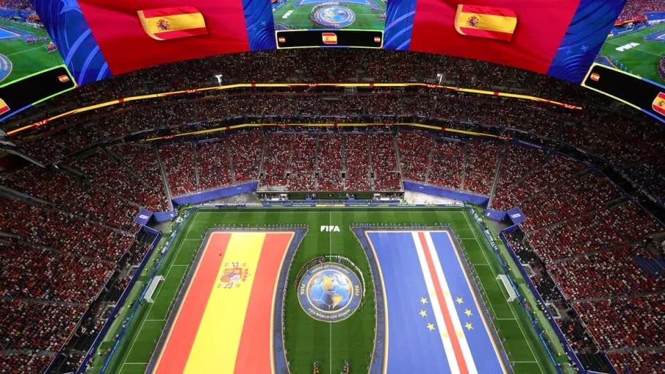 Stadium filled with fans and team flags displayed Stadium filled with fans and team flags displayed