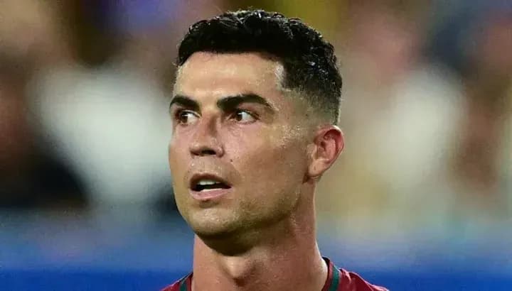 Cristiano Ronaldo during a match, looking focused Cristiano Ronaldo during a match, looking focused