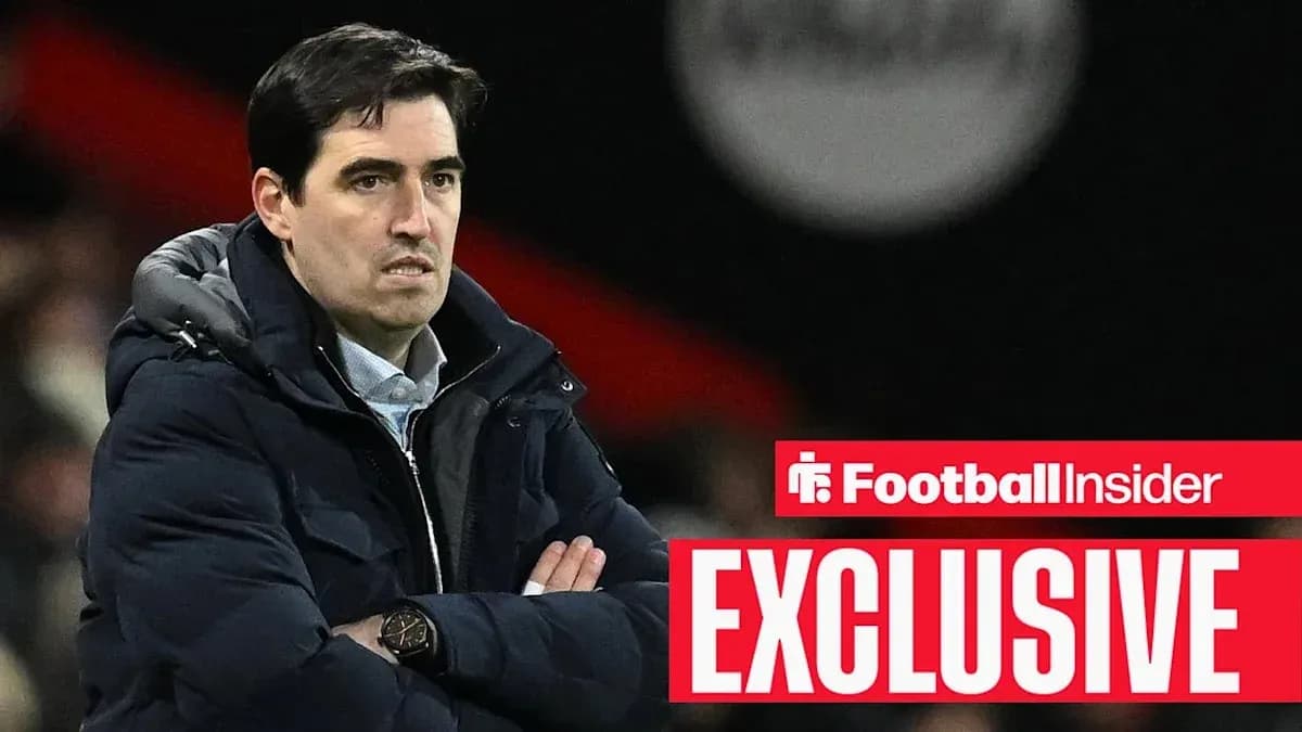 Football manager observing the game from sidelines Football manager observing the game from sidelines