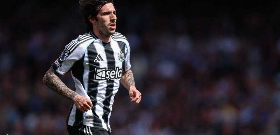 Player running during Newcastle match in black and white kit Player running during Newcastle match in black and white kit