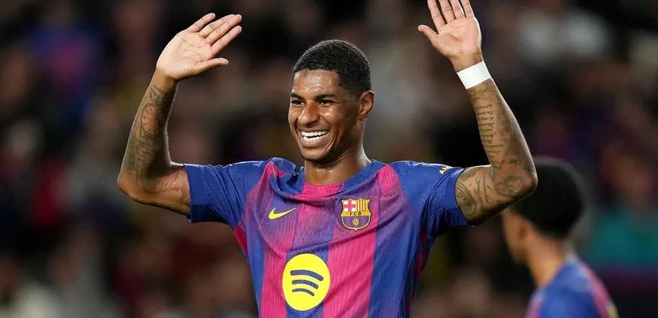 Player celebrating with raised hands during match Player celebrating with raised hands during match