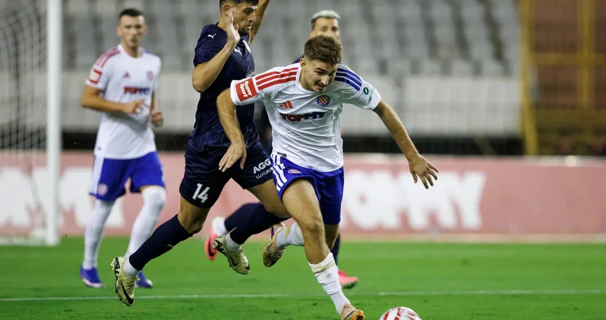 Pafos player challenges HNK Hajduk Split player Pafos player challenges HNK Hajduk Split player