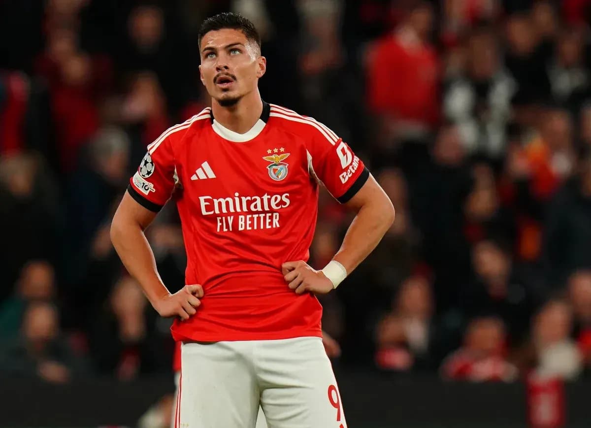 Player in Benfica kit standing with hands on hips Player in Benfica kit standing with hands on hips