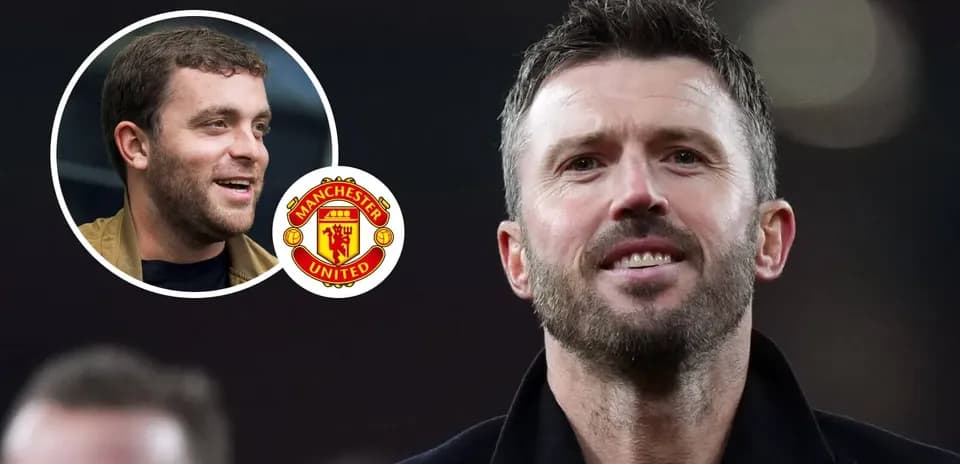Two men with Manchester United logo in background Two men with Manchester United logo in background