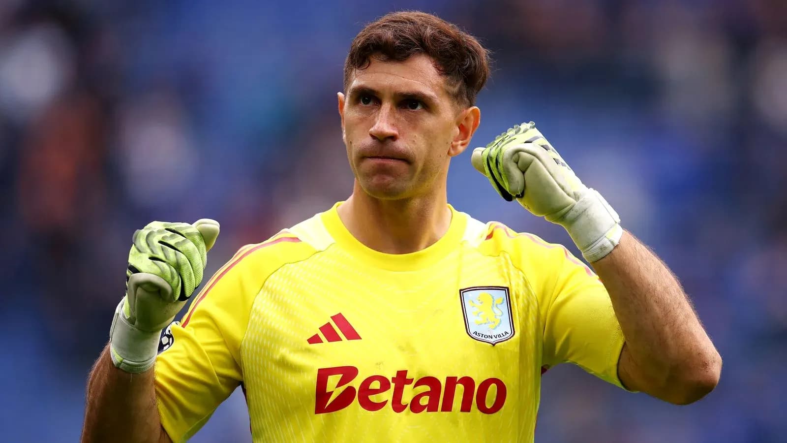 Goalkeeper celebrating with clenched fists in uniform Goalkeeper celebrating with clenched fists in uniform