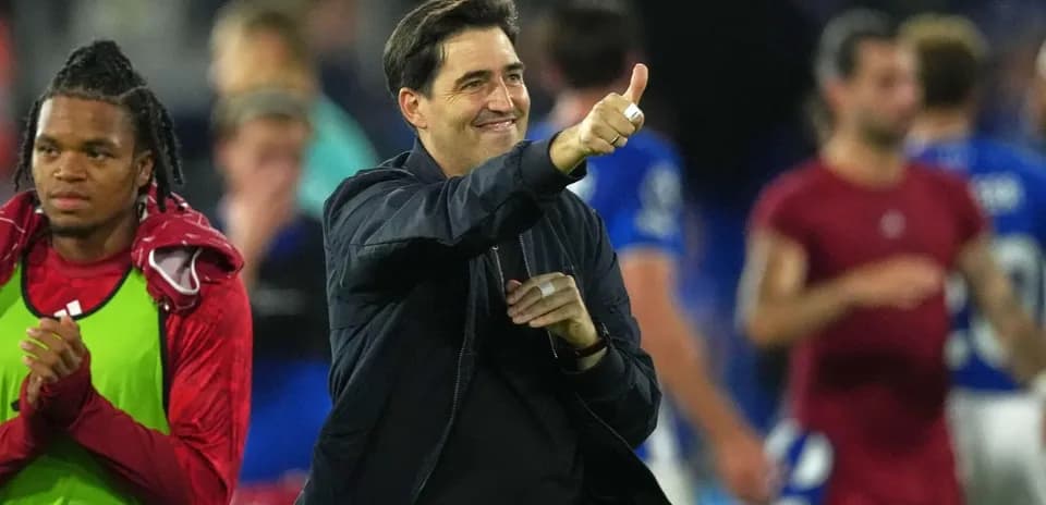 Coach celebrating with thumbs up after match Coach celebrating with thumbs up after match