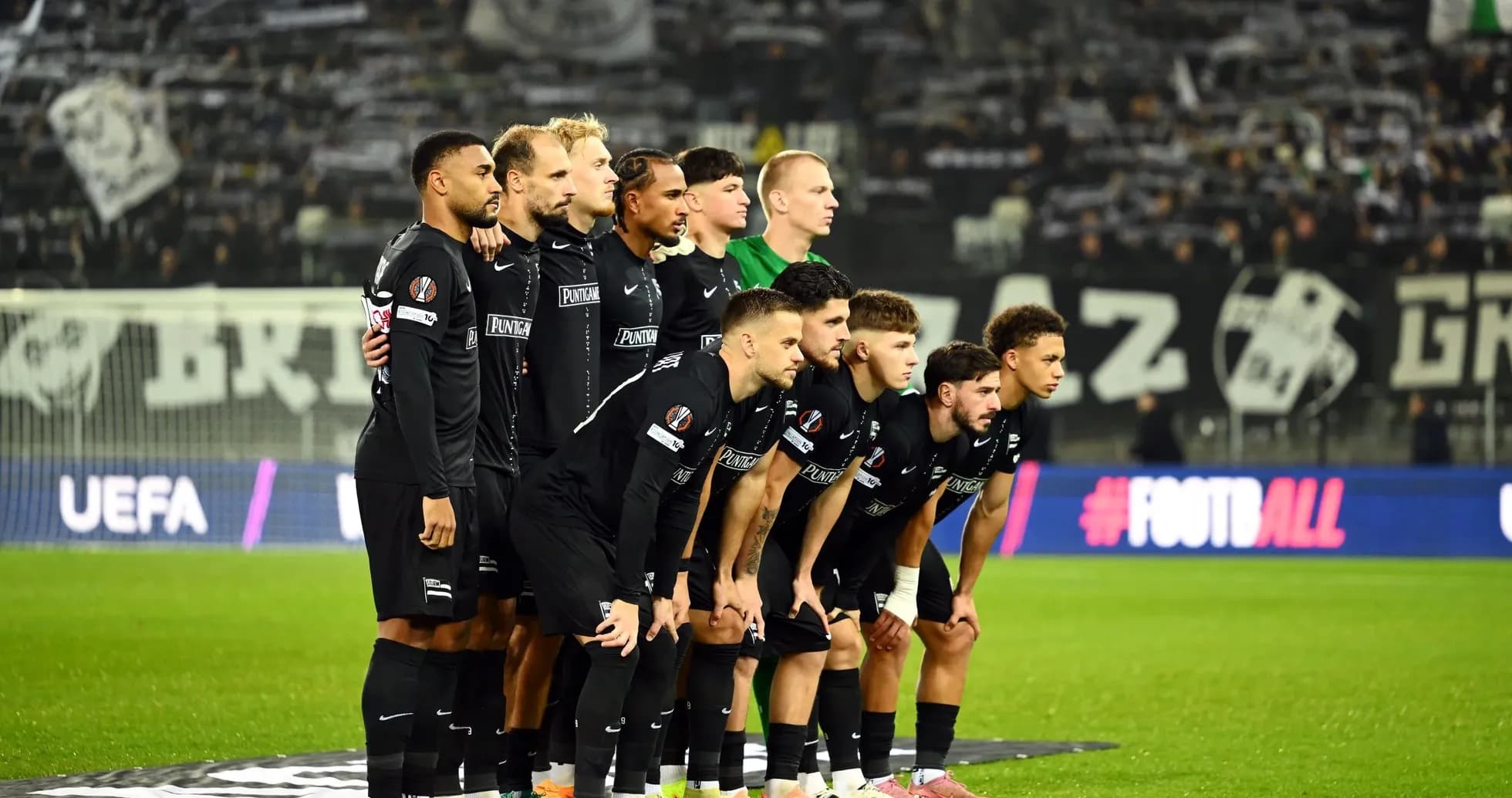 Sturm Graz players posing before the match Sturm Graz players posing before the match