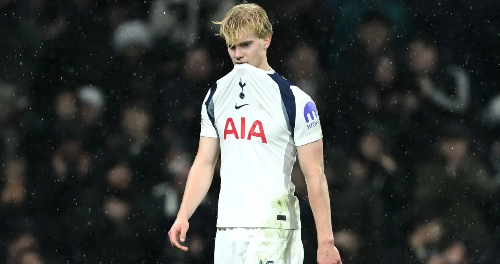 Player in Tottenham kit during rainy match Player in Tottenham kit during rainy match