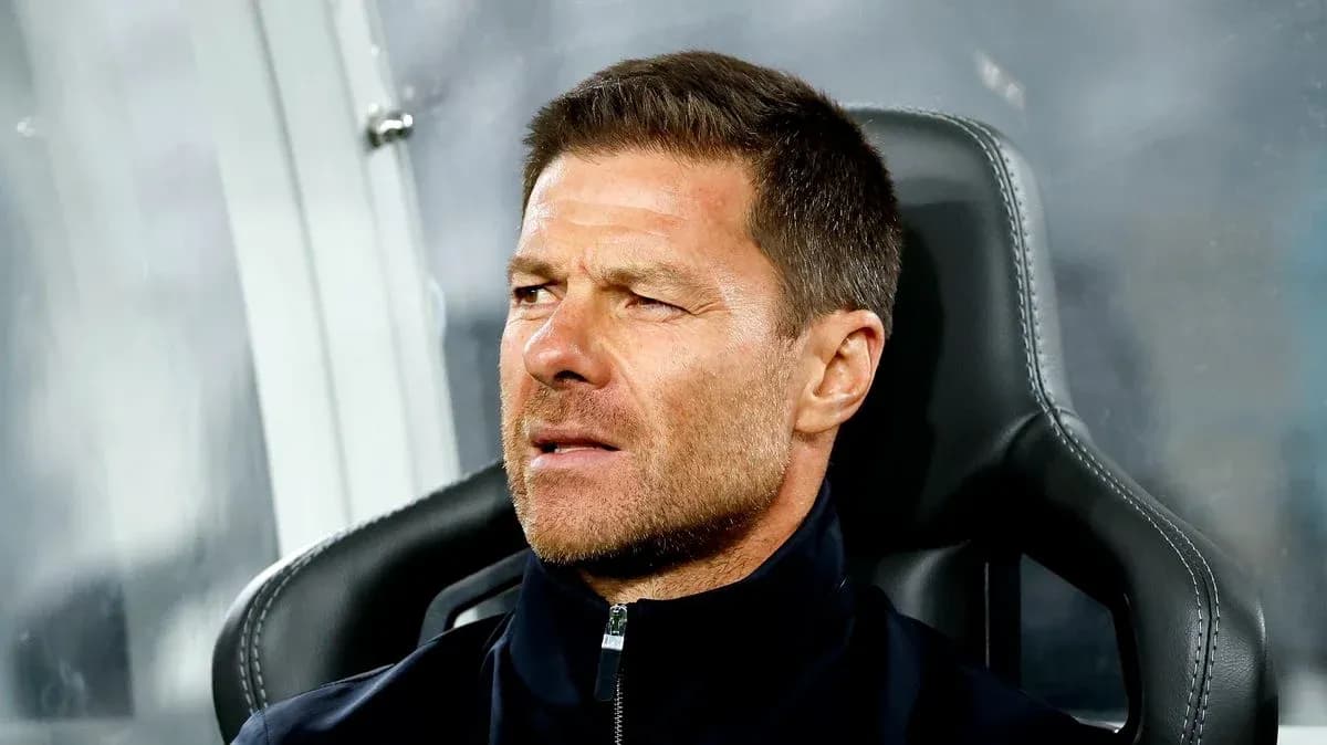 Coach sitting on the bench during a match Coach sitting on the bench during a match