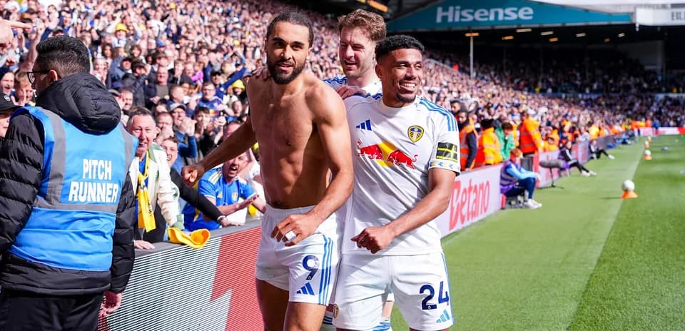 Leeds players celebrating in front of fans Leeds players celebrating in front of fans