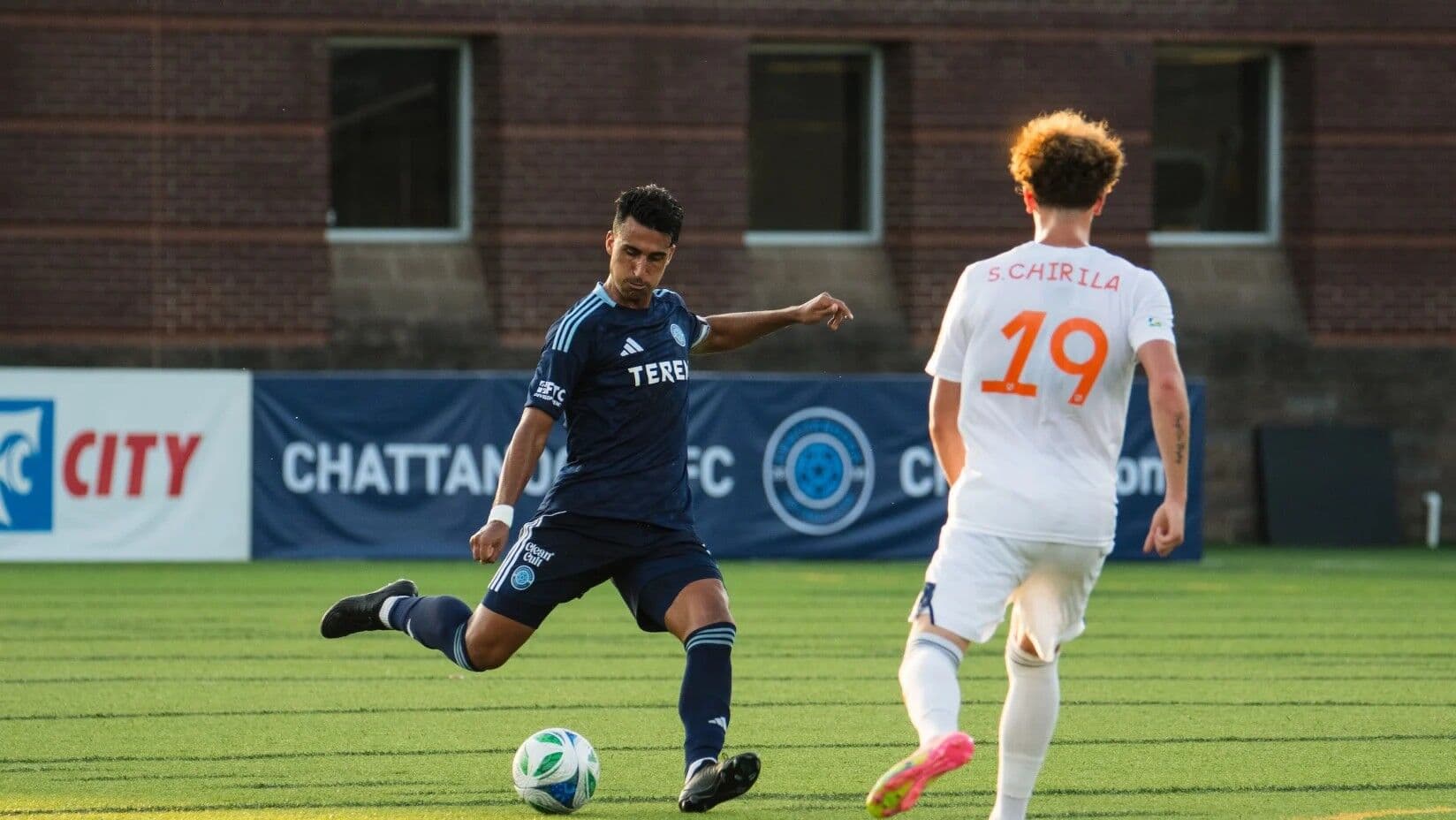 Player kicking ball during FC Cincinnati II match Player kicking ball during FC Cincinnati II match