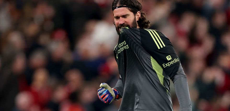 Goalkeeper celebrating with clenched fist during match Goalkeeper celebrating with clenched fist during match