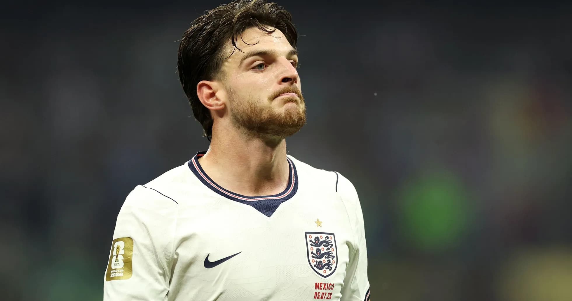 England player in white kit during match England player in white kit during match