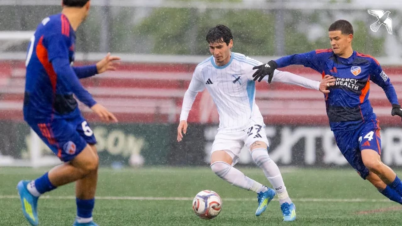Player dribbling the ball in MLS Next Pro match Player dribbling the ball in MLS Next Pro match