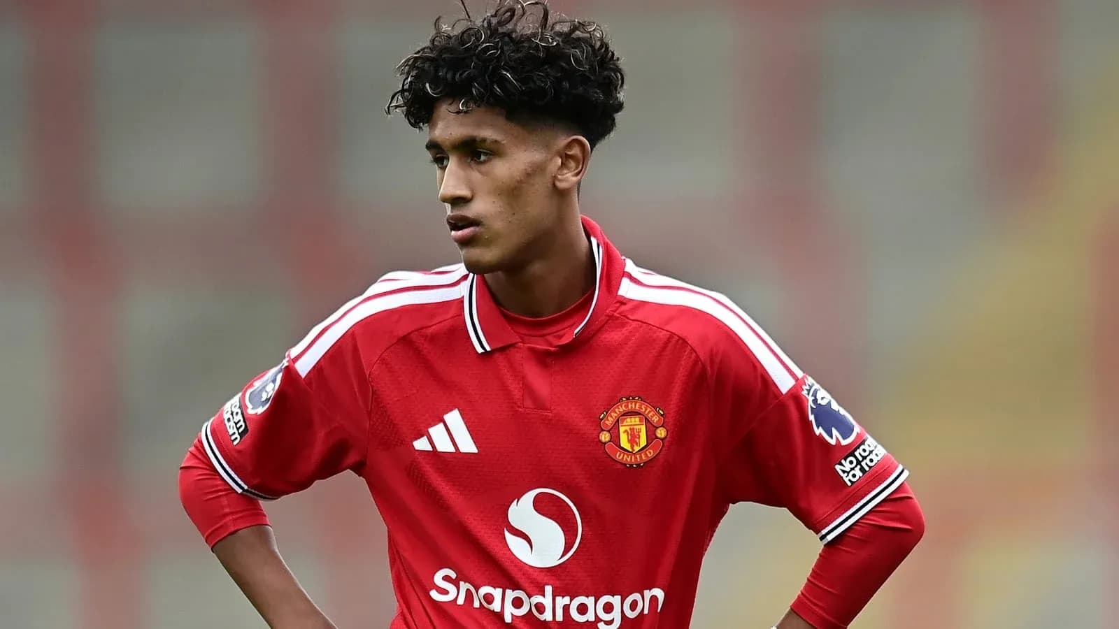 Player in Manchester United kit during match Player in Manchester United kit during match