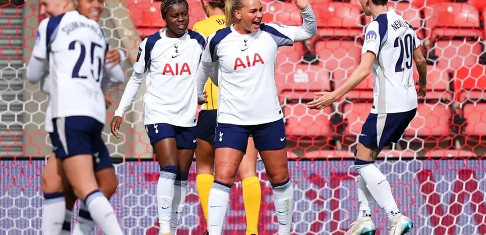 Tottenham players celebrating a goal Tottenham players celebrating a goal