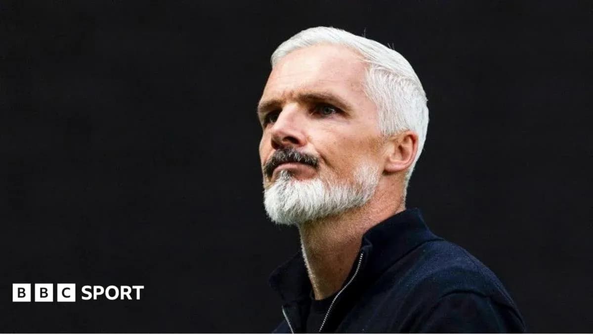 Coach with white hair and beard in profile Coach with white hair and beard in profile