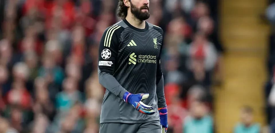Goalkeeper in Liverpool kit during match action Goalkeeper in Liverpool kit during match action