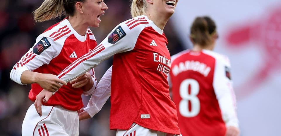 Arsenal players celebrating during FA WSL match Arsenal players celebrating during FA WSL match