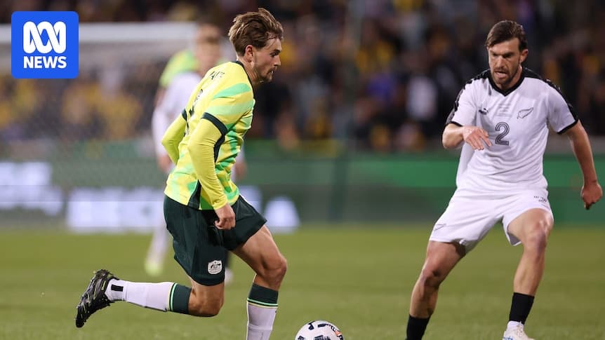 Player dribbling the ball during match action Player dribbling the ball during match action